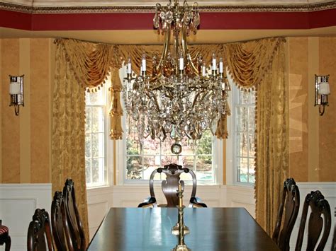 Traditional Formal Gold Dining Room With Crystal