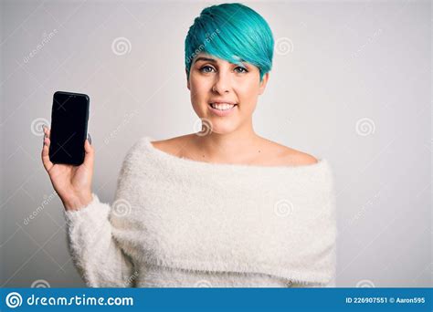 Young Woman With Blue Fashion Hair Holding Smartphone Showing Screen