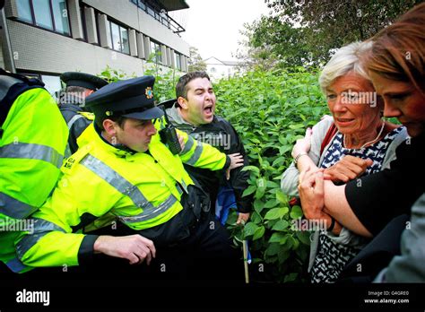 Gardai Hold Back A Protester As He Shouts At Fine Gaels Olivia