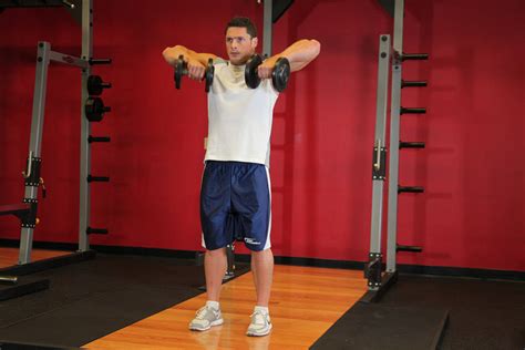 Standing Dumbbell Upright Row Exercise Guide And Video