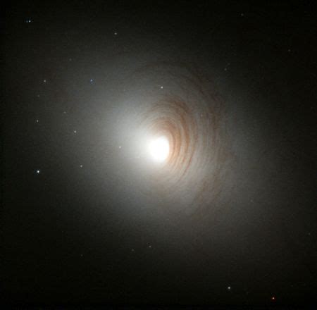 This new galaxy, milkomeda, will become a huge, elliptical galaxy without any arms or spiral. مجرة عدسية - المعرفة