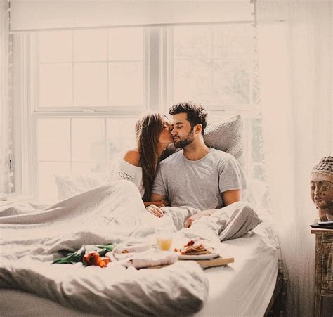 Happy Young Couple In Bed Hoodoo Wallpaper