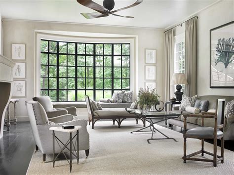 Contemporary Living Room With Large Bay Window And Upholstered ...