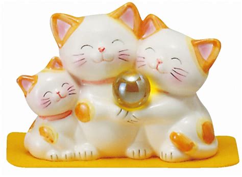 Japanese lucky charms © wei huang / shutterstock. Maneki neko Lucky Cat Family Beckoning cat Good Luck ...