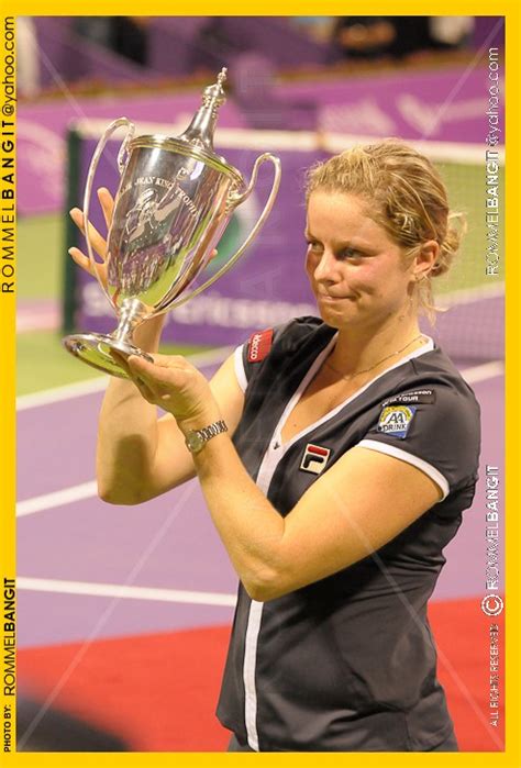 Kim Clijster Holds Her Wta 2010 Championship Trophy For Photographers