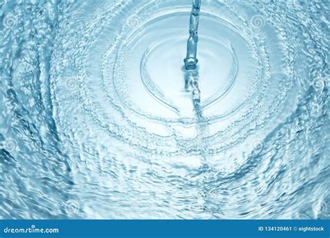 Blue Clear Water With Many Waves Pouring With Splash Stock Image