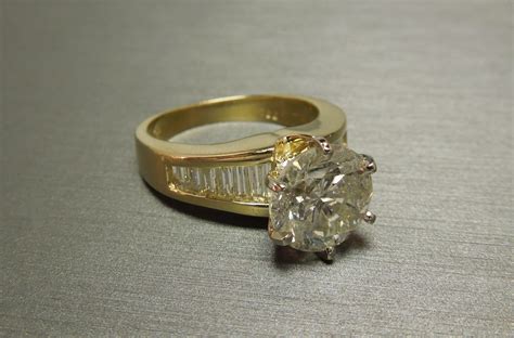 18K 3 carat Diamond Solitaire & Channel Baguette Engagement Ring