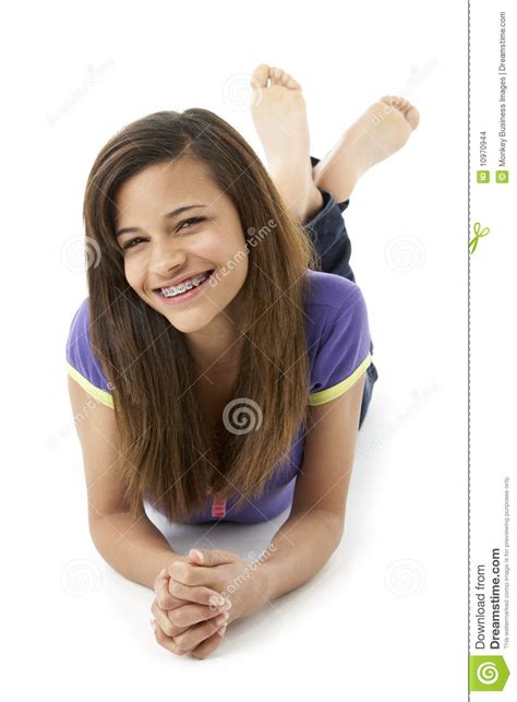 David prado / addictive creative; Teenage Girl Laying On Stomach Stock Photo - Image of ...