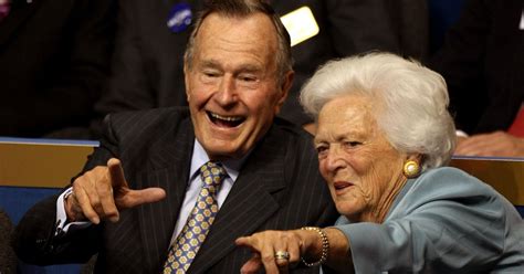 George H W Bush And Barbara Bush Getting Caught By The Kiss Cam Is The