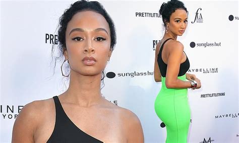 Draya Michele Shows Off Her Tan Lines While In A Curve Hugging Black
