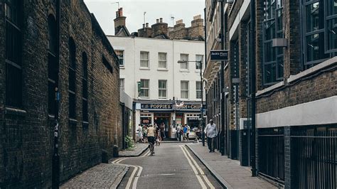 Road Street Sidewalk Cobblestone Bricks Buildings Walls