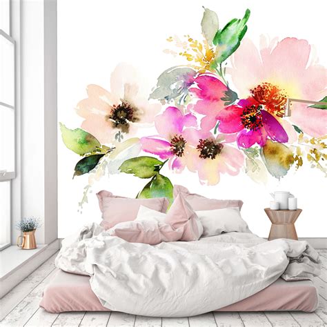 A Bedroom With Flowers Painted On The Wall