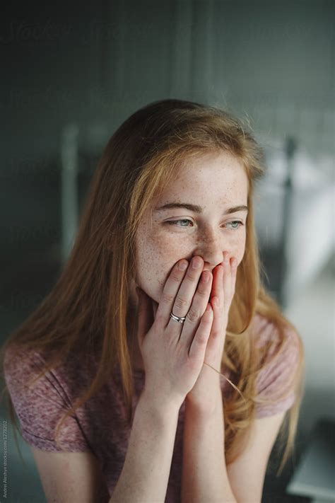 Beautiful Young Girl Is Embarrassed And Laughing By Stocksy Contributor Andrei Aleshyn Stocksy