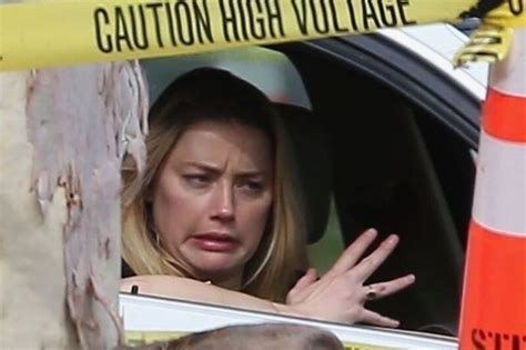 Amber Heard Makes Facial Expressions In Her Car Demotix