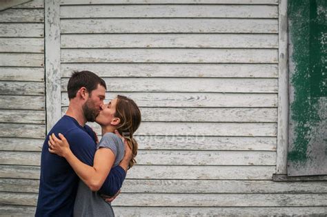 A Man And Woman Kissing — Together Wife Stock Photo 232614014