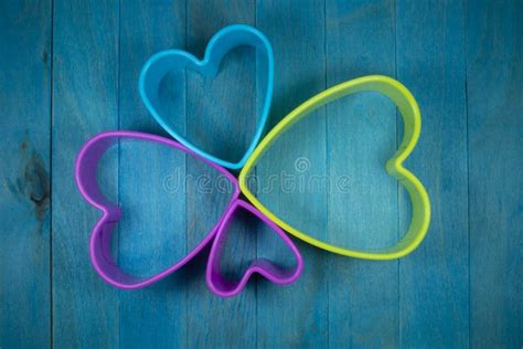 Heart Shaped Figures On Blue Background Stock Photo Image Of Concept