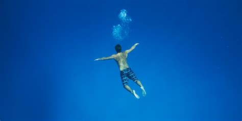 Man Floating Underwater Riverbreak Magazine