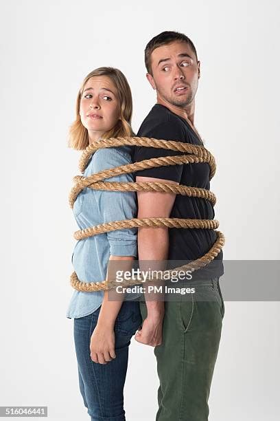 Tied Up Helpless Photos And Premium High Res Pictures Getty Images