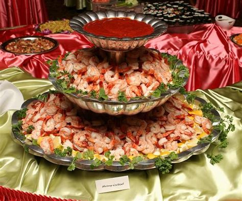 Classic shrimp cocktail is an easy, elegant starter for a special holiday gathering. Pinncatering.com | Buffet food, Party food buffet, Shrimp cocktail display