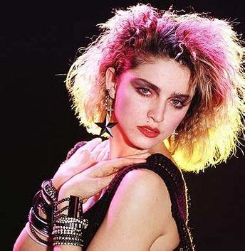 Madonna hairstyles in early 1980s were styled by adding a lot of volume and cutting bangs ta the right side. hairstyles through the decades | Madonna 80s, Madonna ...