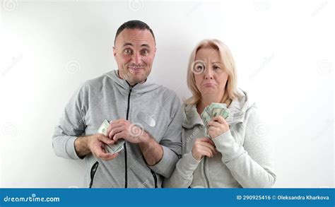 A Middle Aged Wife Asks Her Husband For Money To Buy Dollars And Euros