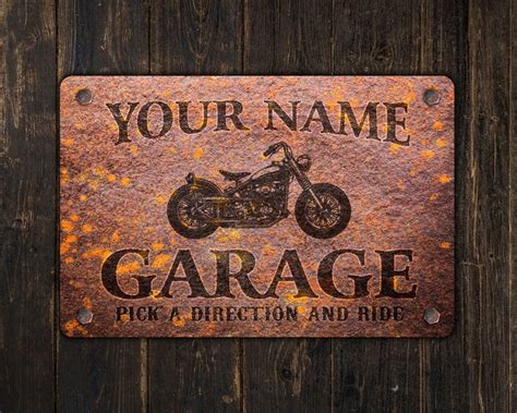 A Rusted Metal Sign That Says Your Name Garage Pick A Direction And Ride