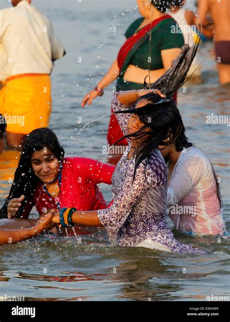 woman bathing in ganga hot