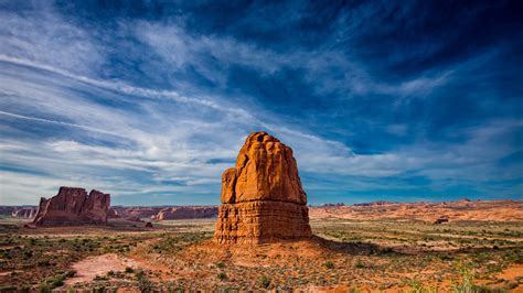 Download Wallpaper 1600x900 Rocks Cliff Valley Landscape Mountains