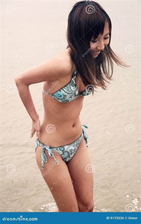 cute asian girl in a bikini royalty free stock image image 9175526
