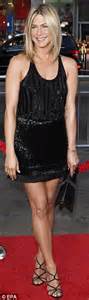 Jennifer Anistons Black Bra Under Tight White Vest Leaves Little To