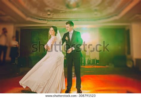 Romantic Couple Dancing On Their Wedding Stock Photo