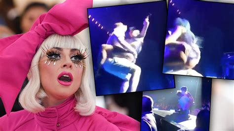 Lady Gaga Falls After Being Dropped By Fan On Stage Video
