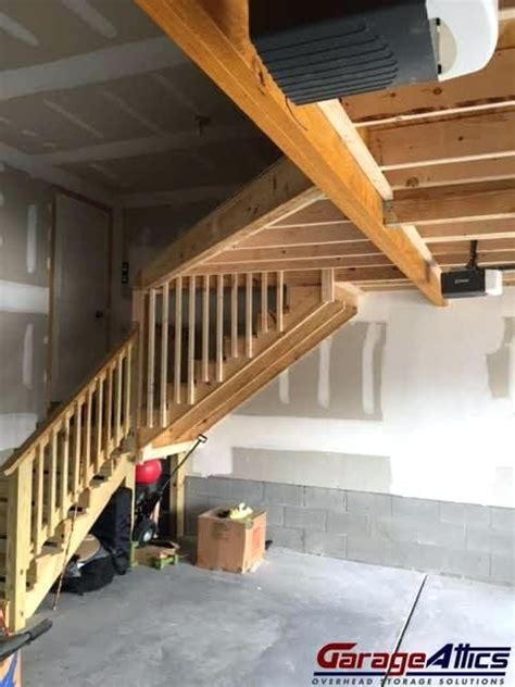 The ladder can be folded up into three sections and fits several. heavy duty attic stairs pull down custom ceiling storage in garage massive overhead storage ...