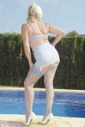 Mature Bbw Sandy Spain Splashing In The Pool In Nylon Stockings And