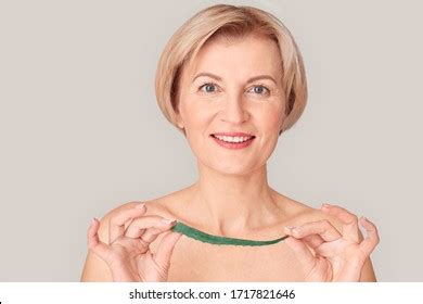 Naked Mature Woman Standing Isolated On Stock Photo 1717821646