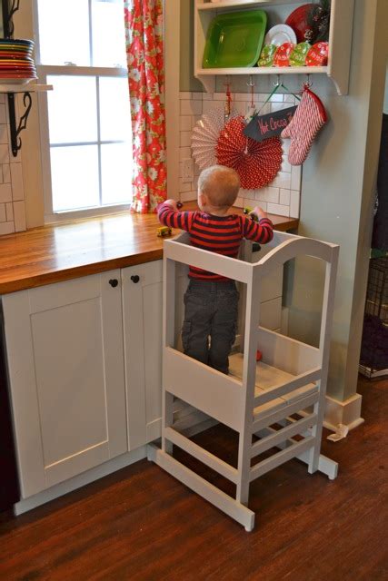 If your kids love to help in the kitchen, you will know how hard it is for them to reach kitchen countertops. A homemade kitchen helper tower for Henry - NewlyWoodwards