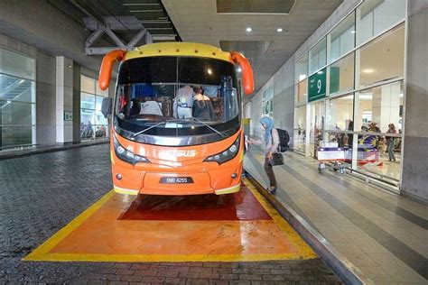 An exterior view of the bandar tasik selatan klia transit station southbound, as seen from the footbridge leading to. Terminal Bersepadu Selatan (TBS), Kuala Lumpur's ...