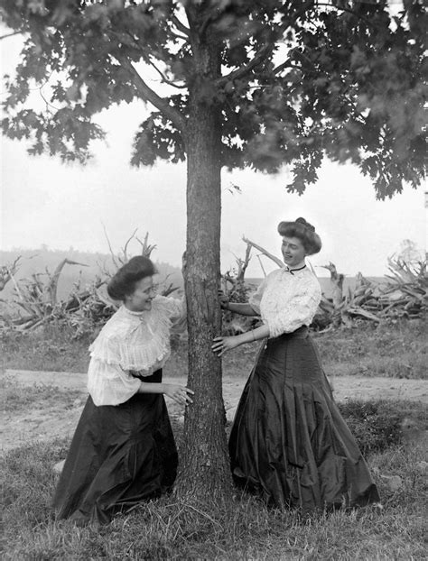 Two Women Chase Each Other Around A Tree Ca 1910 Posters And Prints By Corbis