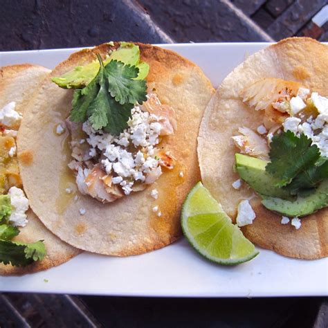 This easy fish tacos recipe uses grilled white fish. Spicy Tequila-Lime Fish Tacos Recipe on Food52 | Recipe ...