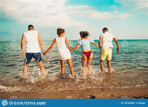 Group Of Friends Together On The Beach Having Fun Stock Image Image