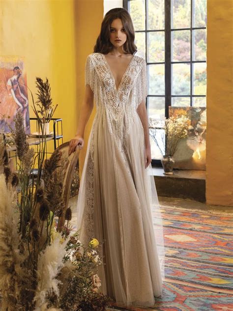 A Line Wedding Dress With Plunging Neckline And Fringe