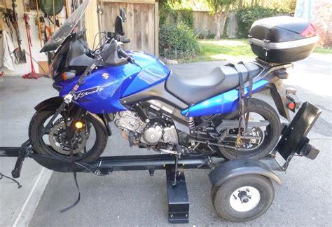 Check out our options page to see a complete list of our custom trailer options. Stinger folding motorcycle trailer