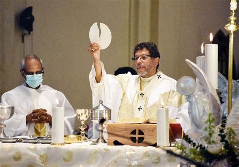 Catholics Receive Holy Communion At Church Local News