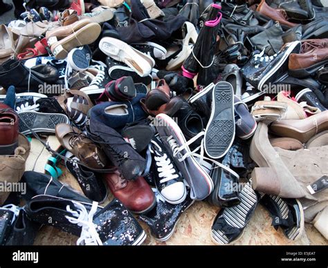 Pile Of Used Worn Secondhand Shoes For Sale Lots Stock Photo Alamy