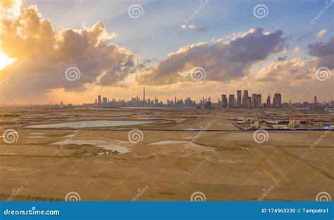 Aerial View Of Dubai Downtown Skyline With Desert Sand United Arab