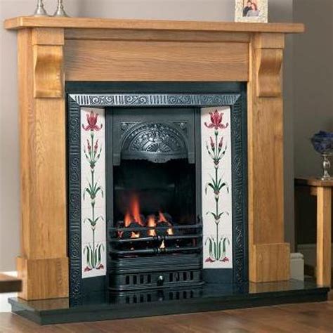 Optional jubilee arched cast insert in highlighted finish with dedicated cast fire back (at discounted rate compared to purchasing separately). Pin on livingroom fireplace