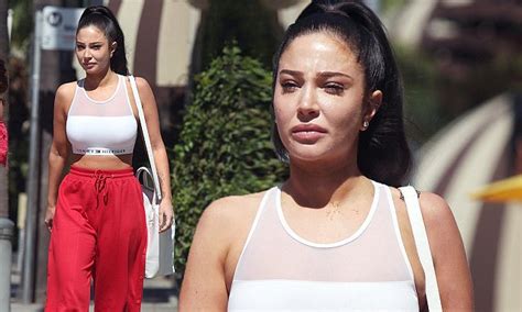 Tulisa Contostavlos Flashes Her Toned Stomach In A White Crop Top