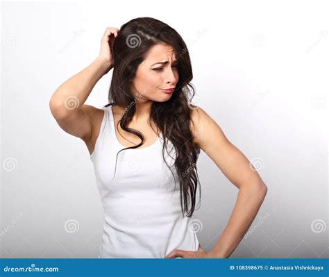 Confusion Unhappy Brunette Woman Thinking And Scratching The Head In White T Shirt On White