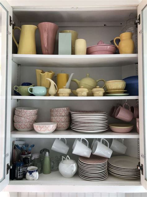 To begin, pull all your dishes out of your cabinets to see what you have to work with. Organize your Kitchen Cabinets