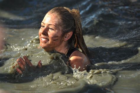 Belinda Ward Ends Up In The Muddy Water At Tough Buy Photos Online Sunshine Coast Daily
